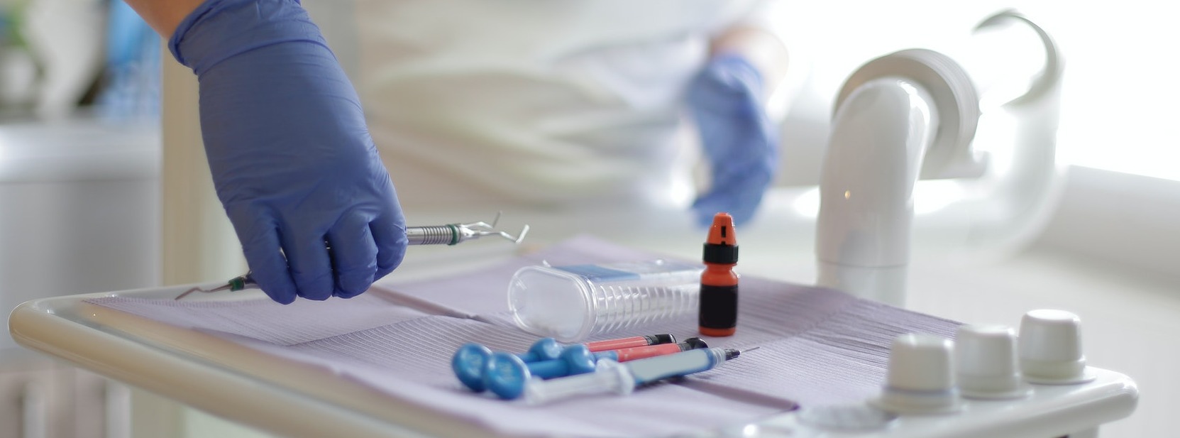 surgeon holding medical equipment